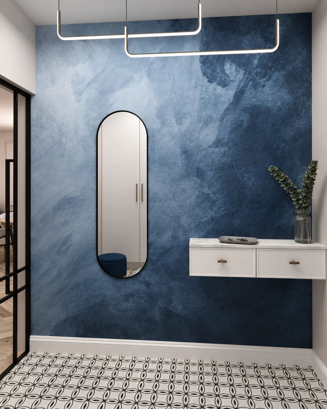 Wiatrołap z granatową ścianą, białą konsolą i owalnym lustrem, projekt wnętrza domu w Mójczej pod Kielcami
